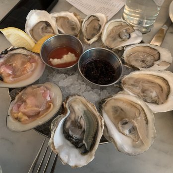Neptune Oyster - Clockwise starting from top: Neptune pearl (3) island creek Duxbury (4) Kumamoto and last are cherry stone clams - Seafood Near Me - Boston, Massachusetts