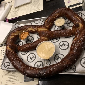 Square Roots - Giant stone fired pretzel (serves 4-6) with Pepper Jack Queso, Honey Dijon, and Pimento Cheese - Gastropubs Near Me - Crown Point, Indiana