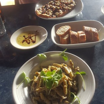 Més Que - Our food served with warm bread and seasoned olive oil. So good! - Sports Bars Near Me - Buffalo, New York