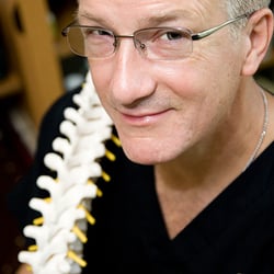Joe's Distinctive Chiro-Care - Dr Joe with his favorite patient education tool.