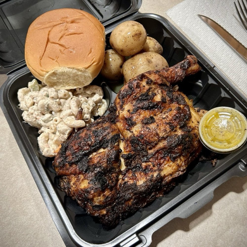 1/2 chicken dinners with macaroni salad and buttered spuds
