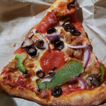 Blaze Pizza - This photo shows toppings a little better, but majority of pizza skimpy on toppings - Salad Near Me - Bakersfield, California Blaze Pizza - This photo shows toppings a little better, but majority of pizza skimpy on toppings - Salad Near Me - Bakersfield, California