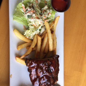 Turn 12 - 1/4 rib rack with fries and some green stuff on the side. Excellent choice for lunch. - American Near Me - Monterey, California