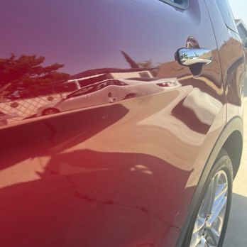 BP Ford - Large ding on passenger door from service - Auto Repair Near Me - Long Beach, California BP Ford - Large ding on passenger door from service - Auto Repair Near Me - Long Beach, California