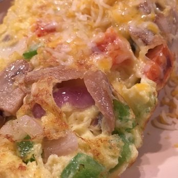 Cast Iron Grill - Uncooked veggies and HUGE chunks of uncooked onion - Breakfast & Brunch Near Me - Lubbock, Texas