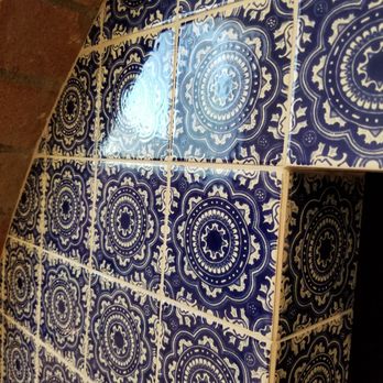 Craig Miller Tile & Stone - The grouting is an antique white to match the white of the tile. - Tiling Near Me