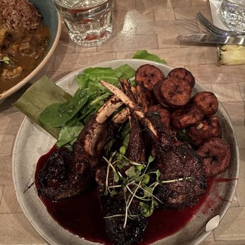 Omar's Kitchen and Rum Bar - Hibiscus Glazed Lamb - Caribbean Near Me - New York, New York Omar's Kitchen and Rum Bar - Hibiscus Glazed Lamb - Caribbean Near Me - New York, New York