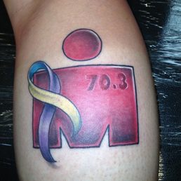 My very first tattoo, the Ironman M Dot (half IM 70.3 miles). The bladder cancer ribbon for my father. My very first tattoo, the Ironman M Dot (half IM 70.3 miles). The bladder cancer ribbon for my father.