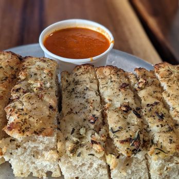 Repetti's Pizza and Provisions - Complimentary focaccia bread and dipping sauce - Pizza Near Me - Honolulu, Hawaii Repetti's Pizza and Provisions - Complimentary focaccia bread and dipping sauce - Pizza Near Me - Honolulu, Hawaii
