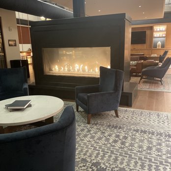Canopy by Hilton Baltimore Harbor Point - Fireplace - lobby - Hotels Near Me - Baltimore, Maryland