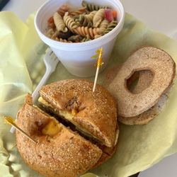 Some Bagels - Breakfast sun dried tomato bagel sandwich with side of Pasta Salad