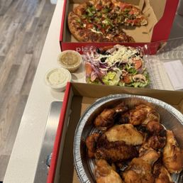 Medium Pizza, 10 piece hot wings with no sauce and a regular anti pasta salad.