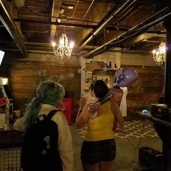Headquarters Beercade River North - Playing VR. Basement - Bars Near Me - Chicago, Illinois