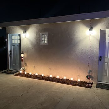 Skyline Construction - Front door and laundry room entrance with casement window - General Contractors Near Me
