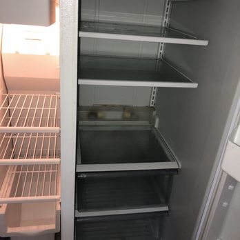 Kustom Kleaning - Not one light in the refrigerator was working but you can see how gross this was. She insisted this was cleaned. SHE IS A LIAR. - Home Cleaning Near Me