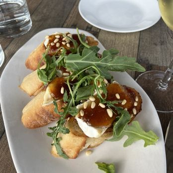 The Corner Bistro - Brie and fig jam bruschetta. So good! - Tapas/Small Plates Near Me - Bellaire, Michigan The Corner Bistro - Brie and fig jam bruschetta. So good! - Tapas/Small Plates Near Me - Bellaire, Michigan