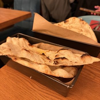 Madam Chutney - Garlic and butter naan - Indian Near Me - Munich, BY Madam Chutney - Garlic and butter naan - Indian Near Me - Munich, BY
