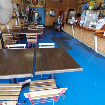 Margarita Island - the inside of a restaurant with tables and benches - Bars Near Me - Brooklyn, New York Margarita Island - the inside of a restaurant with tables and benches - Bars Near Me - Brooklyn, New York