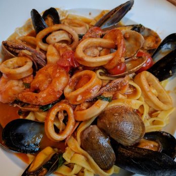 Rustico - Seafood fettucine. Good but the seafood paella is better! - Italian Near Me - Oak Park, Illinois Rustico - Seafood fettucine. Good but the seafood paella is better! - Italian Near Me - Oak Park, Illinois