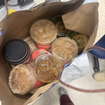 Alfred Coffee - 7 drinks and 1 bagel in a flimsy paper bag that's ripped on all corners - Coffee & Tea Near Me - Los Angeles, California