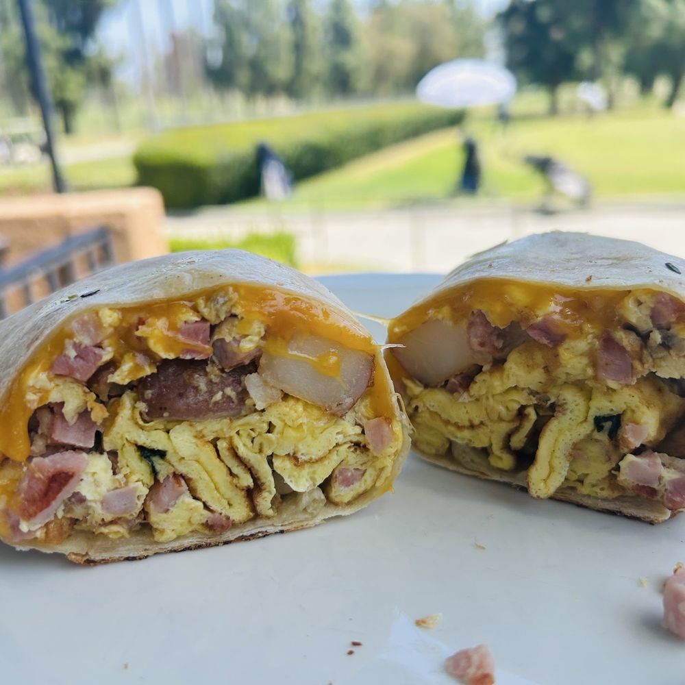 Almansor Grill - 4/17/26 Lovely day, patio area facing the golf course, Breakfast Burrito (Hubby's choice, too much spuds ) - American Near Me - Alhambra, California