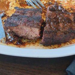 Burned to shit steak.
