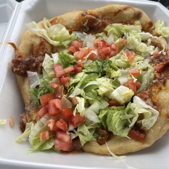 Ofelia's Frybread - Shredded beef lettuce tomatoes cheese beans and red sauce. - Food Stands Near Me - Casa Grande, Arizona Ofelia's Frybread - Shredded beef lettuce tomatoes cheese beans and red sauce. - Food Stands Near Me - Casa Grande, Arizona