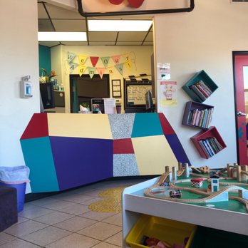 Tucson Smiles Pediatric Dentistry - View of front desk...the banner says "we  heart our admins" and this definitely shows when you interact with their admins! - Pediatric Dentists Near Me - Tucson, Arizona