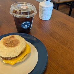 Sweetbeans Coffee - Iced coffee and sausage English muffin breakfast sandwich