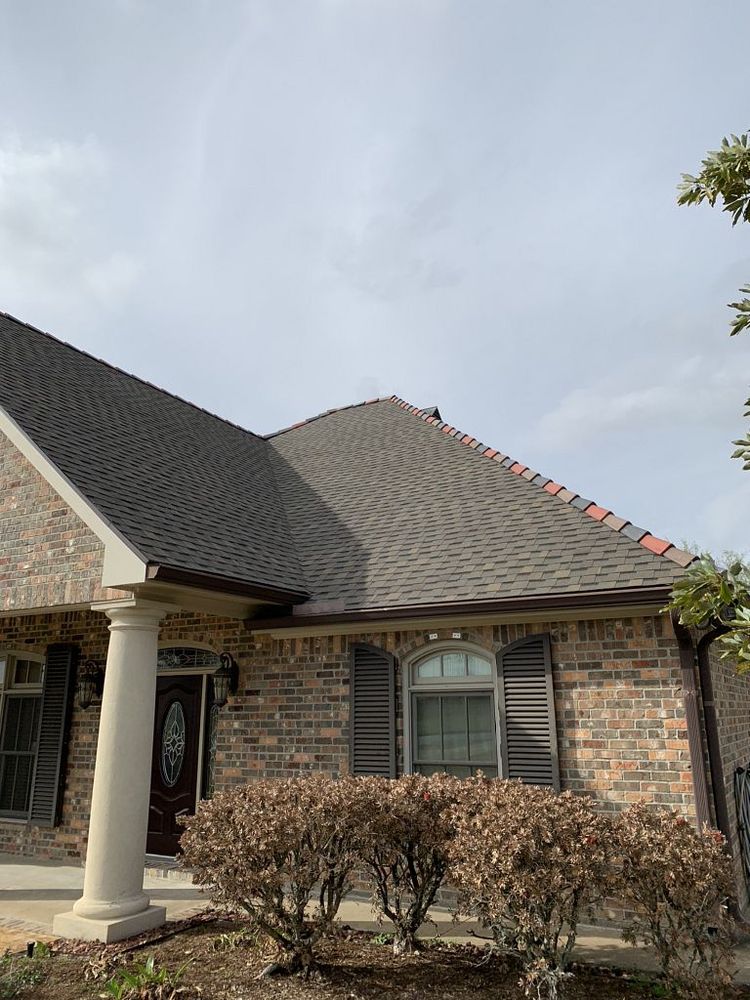 Slide of Pelican Roofing Company