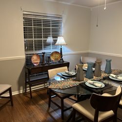 My dining table that matched my living room end table and coffee table. It is wobbly. Purchased Memorial Day weekend it is July 17th.