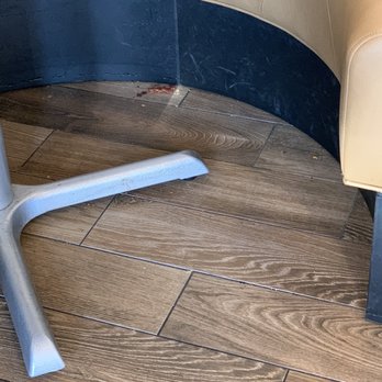 Wendy's - the corner of a restaurant with a table and chairs - Fast Food Near Me - Palmdale, California