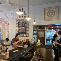 La Capital Tacos - Dessert menu and bar area