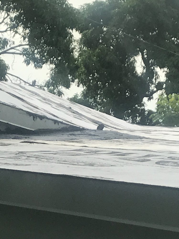 Slide of Payton Roofing