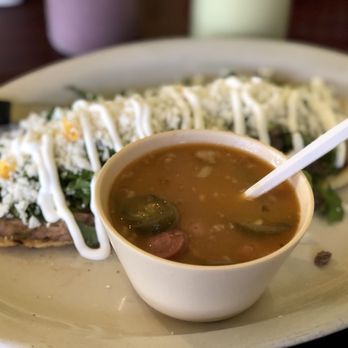 Erick's Mexican Restaurant - Huarache de asada hotdog in borracho beans - Mexican Near Me - San Antonio, Texas Erick's Mexican Restaurant - Huarache de asada hotdog in borracho beans - Mexican Near Me - San Antonio, Texas