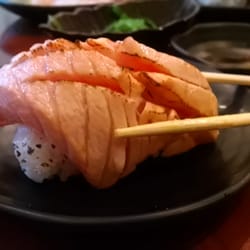 真味日本料理 - Gigantic charred salmon nigiri 火焰三文魚壽司