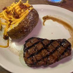 Texas Roadhouse - 8 oz Filet (Medium) with loaded baked potato!  Perfect!