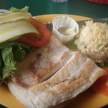 Zelda's - Grilled Mahi Sandwich 12.95 -charbroiled and topped with pesto butter served on a french roll - Bars Near Me - Capitola, California