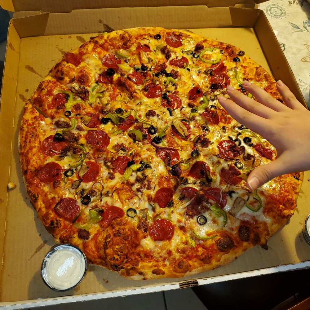 Clockwork Pizza - XL Godfather. (Hand for size proportion) - Pizza Near Me - Tempe, Arizona Clockwork Pizza - XL Godfather. (Hand for size proportion) - Pizza Near Me - Tempe, Arizona