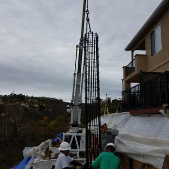 Unlimited Drilling & Foundations - Placing steel for caissons to support retaining wall - Masonry/Concrete Near Me - Santee, California Unlimited Drilling & Foundations - Placing steel for caissons to support retaining wall - Masonry/Concrete Near Me - Santee, California