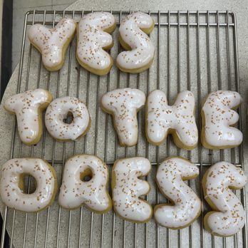A One Donuts - the words yes to drizzle on a cooling rack - Donuts Near Me - North Richland Hills, Texas A One Donuts - the words yes to drizzle on a cooling rack - Donuts Near Me - North Richland Hills, Texas