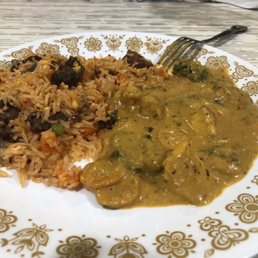 Chili garlic fried rice w lamb and veggie korma in the right. Nice balance bc the korma is sweet and rich. Chili garlic fried rice w lamb and veggie korma in the right. Nice balance bc the korma is sweet and rich.