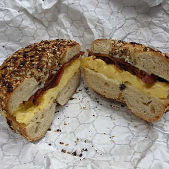 Pavement Coffeehouse - The Sunrise bagel sandwich: egg, bacon, cheese on an Everything bagel. - Coffee & Tea Near Me - Boston, Massachusetts Pavement Coffeehouse - The Sunrise bagel sandwich: egg, bacon, cheese on an Everything bagel. - Coffee & Tea Near Me - Boston, Massachusetts