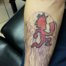 This was my fiancés "before" tattoo with the outline of his coverup. This was my fiancés "before" tattoo with the outline of his coverup.