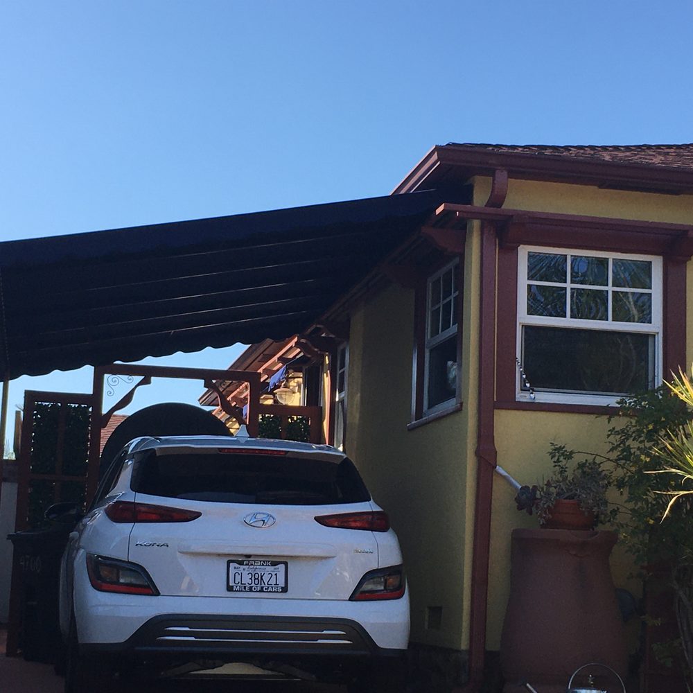 New Sunbrella Captain Navy carport awning. New Sunbrella Captain Navy carport awning.