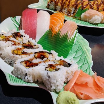 Sushi-Cho - Cho Specials (eel roll) and tootsie roll in background - Japanese Near Me - Tucson, Arizona Sushi-Cho - Cho Specials (eel roll) and tootsie roll in background - Japanese Near Me - Tucson, Arizona