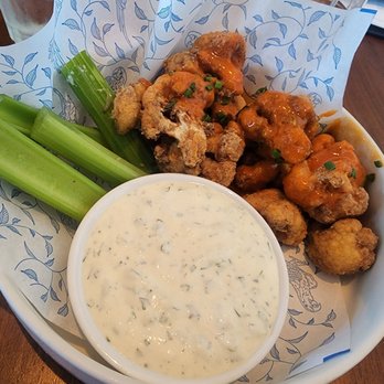 Earls Kitchen + Bar - Buffalo Cauliflower! Must must get this app! (Vegan ranch FTW!!) - New American Near Me - Orlando, Florida