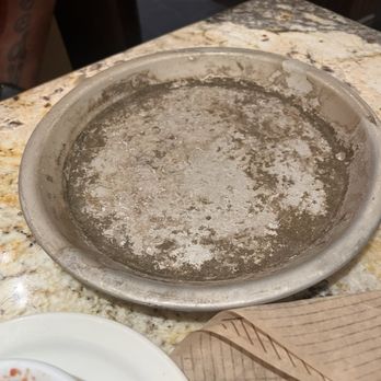 Cheddar's Scratch Kitchen - Our croissants were served on this!! They put a paper over it and whoever in the the kitchen did this should be a shame of themselves - American Near Me - Houston, Texas