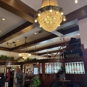 Vintage Press - Chandelier. And live pianist on second level on certain days of the week. - American Near Me - Visalia, California Vintage Press - Chandelier. And live pianist on second level on certain days of the week. - American Near Me - Visalia, California