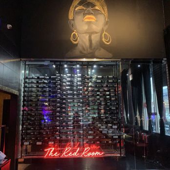 The Icon Restaurant and Lounge - Wine wall - Lounges Near Me - Richardson, Texas